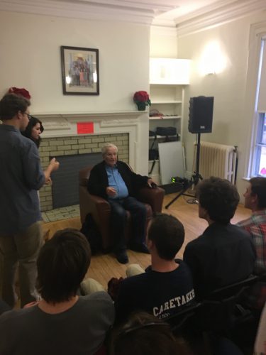 Noam Chomsky talks with students at Burnett House