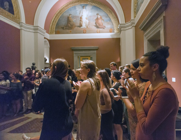 Students enjoy a reception at the Bowdoin College Museum of Art.