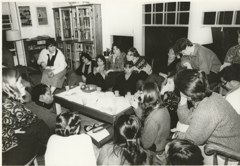 Members of the Women's Resource Center Collective at 24 College St., including Marya Hunsinger (Bowdoin faculty, farthest left on couch), the first coordinator of the Women's Resource Center and the first instructor in Women's Studies.