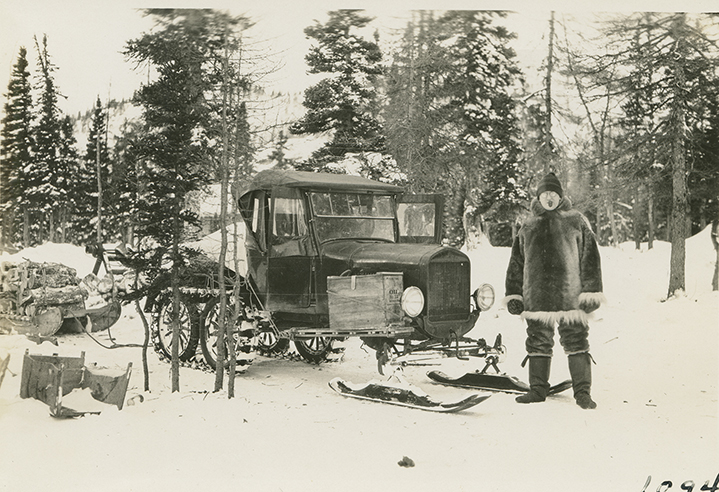 Martin Vorse next to Labrador's first snowmobile