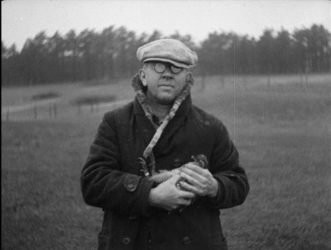 Alfred Otto Gross holding “Booming Ben,” the last of the species.