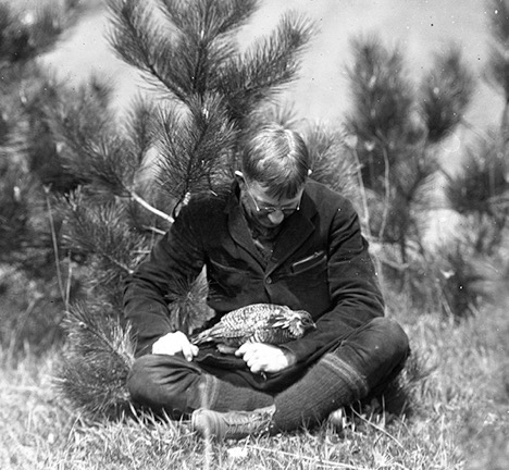 Alfred Otto Gross with heath hen, Martha’s Vineyard, May 16, 1923