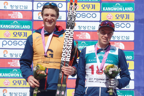 Jake Adicoff ’18 (right) at the PyeongChang 2018 Test Event and World Cup winners podium with guide Sawyer Kesselheim. Photo: US Para Nordic Team Director John Farra