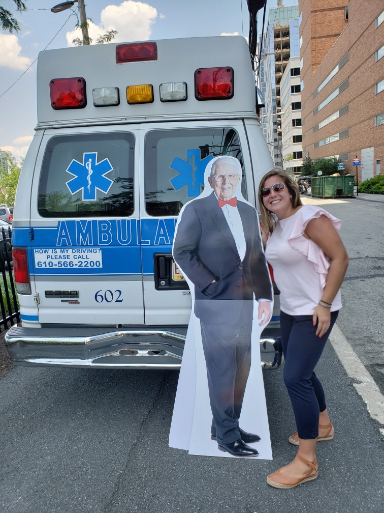 Genevieve Anderle ’19 poses with a cut-out of Dr. Aaron T. Beck