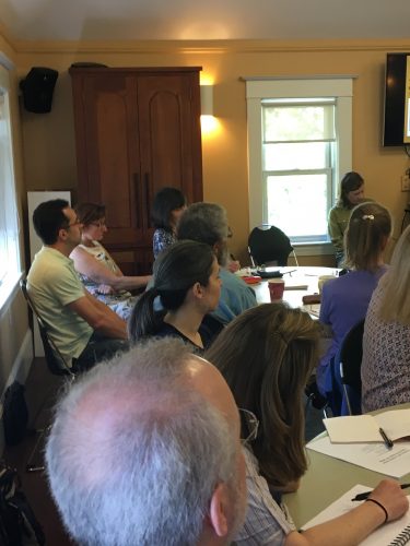 Faculty listen to the presentation on cultural awareness