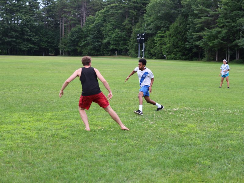 Simon Cann '19 tries to tag Senay Yibrah '19.