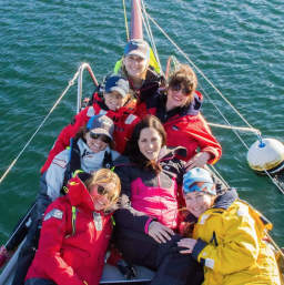 The Sail Like a Girl crew. Jeanne Assael Goussev ’99 is in the center.