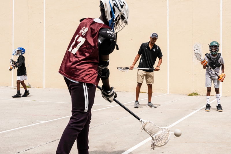 Students combine lacrosse instruction with tutoring and advising.