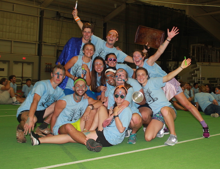 A group of students affiliated with a College House pose for a group picture