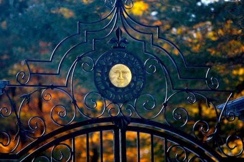 Gates to Whittier Field feature the historic Bowdoin sun.