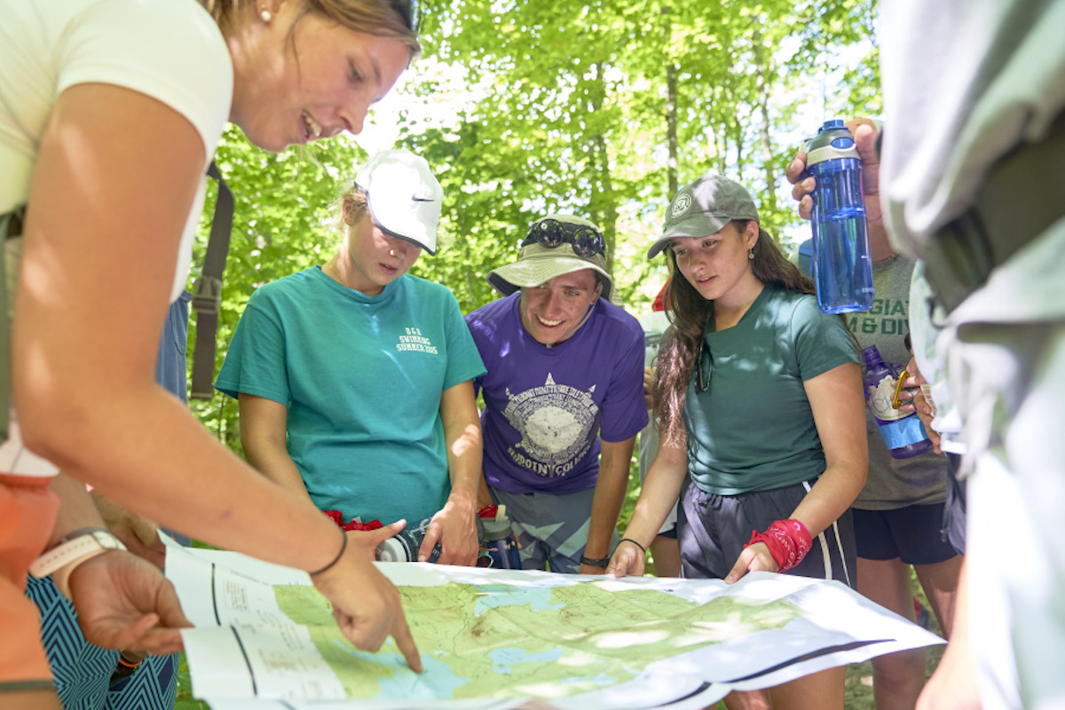 Students consult a map