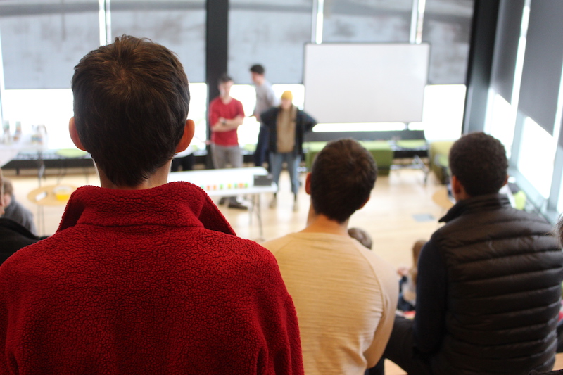 Middle school students listen to a geology lesson