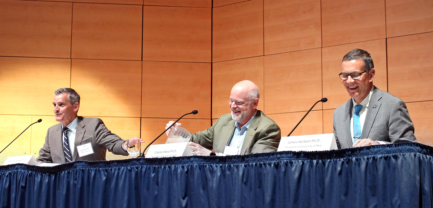 From left to right, presidents Glenn Cummings of USM, Clayton Rose of Bowdoin, and James Herbert of UNE.