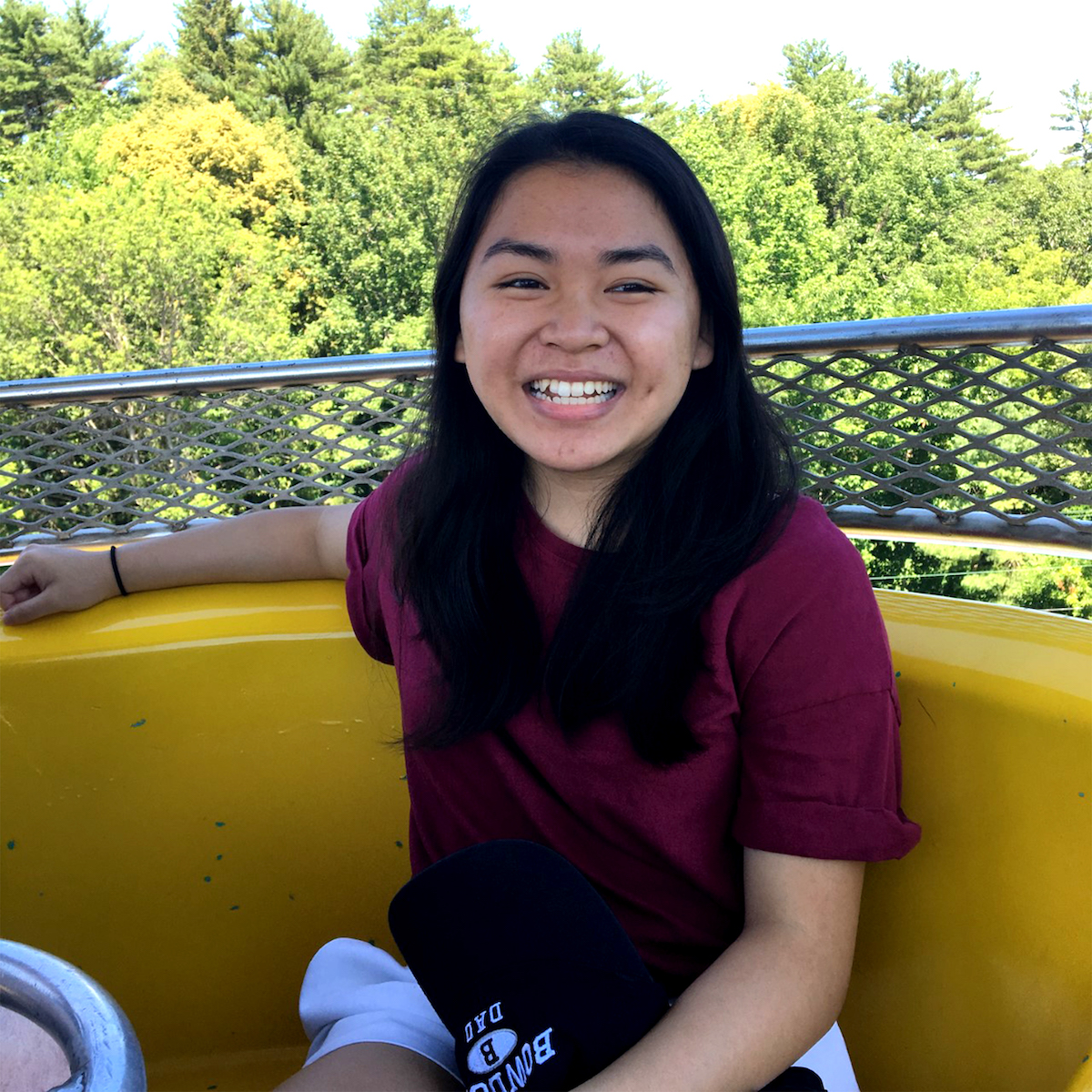 Tam Phan sitting outside on a deck