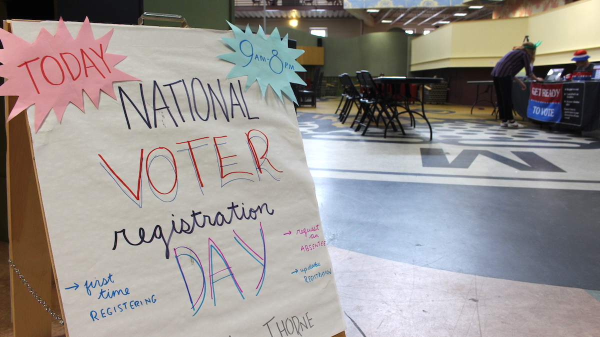 A table set up for voter registration day