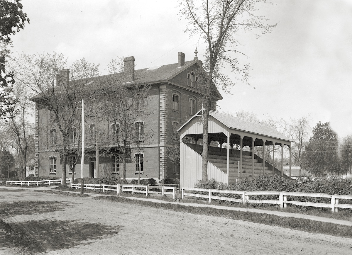 Adams Hall, shown with the Old Grandstand circa 1900, housed the Medical School of Maine.