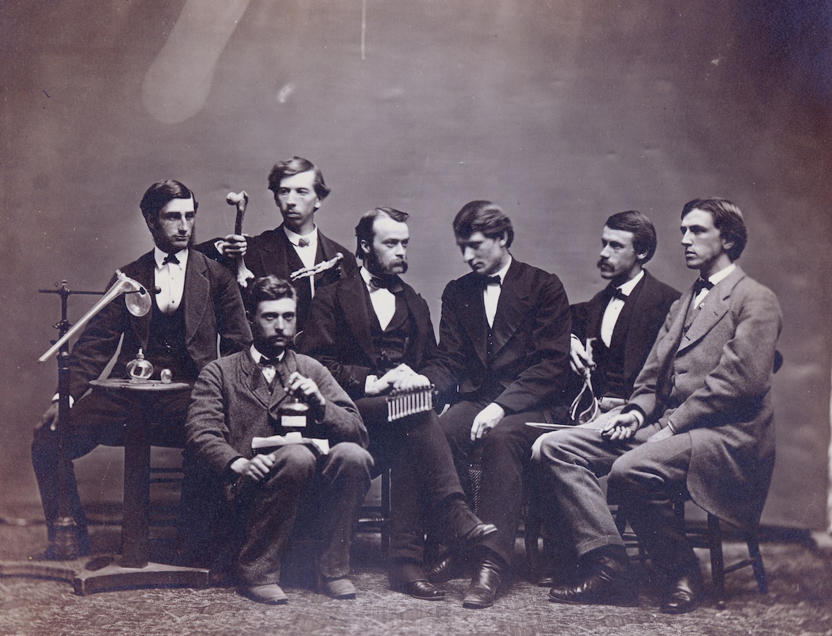 Medical School of Maine Class of 1869 with various medical instruments.