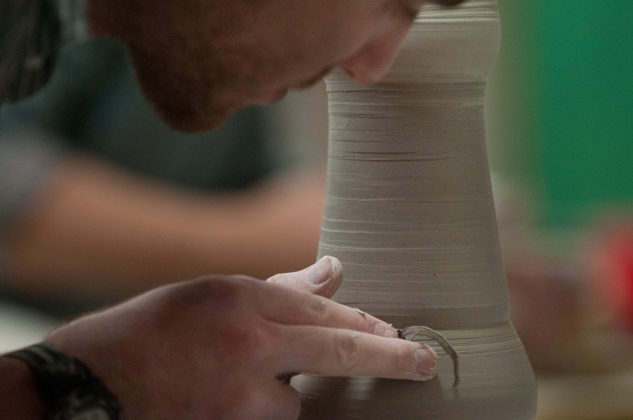 Student doing pottery