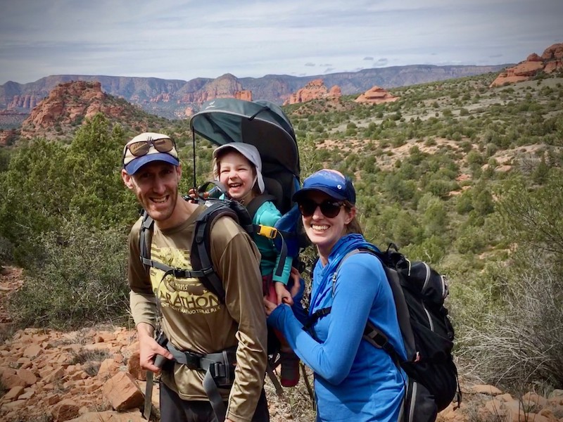 Amanda Burrage ’04 with her husband, Jarred McAteer ’04, and baby.