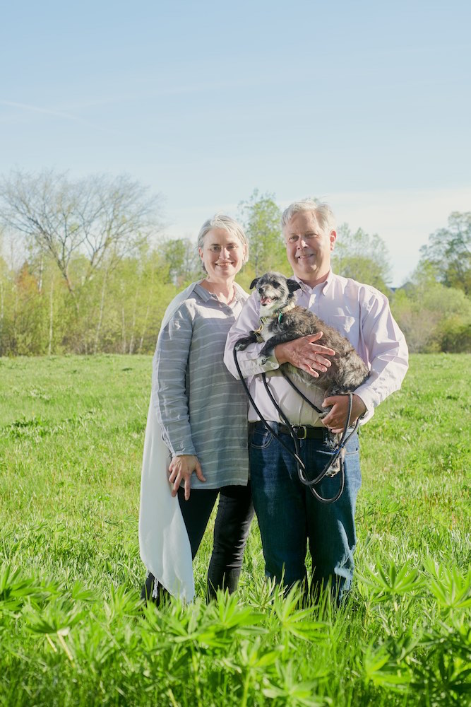 Scott Budde ’81, Charlotte Cole ’82, and their dog Casco