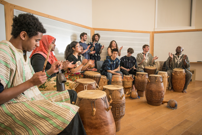 Students drumming in an Africana Studies class
