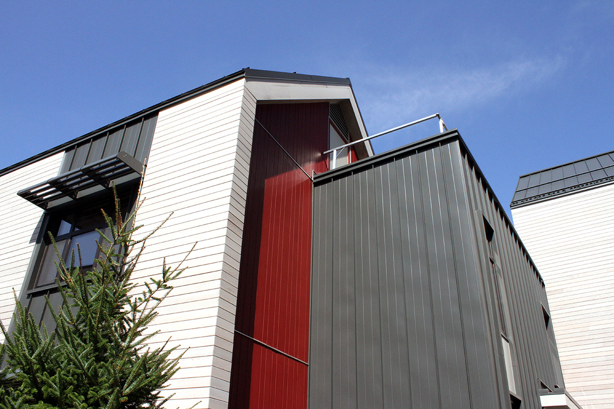 Exterior view of red and white contrasting wall