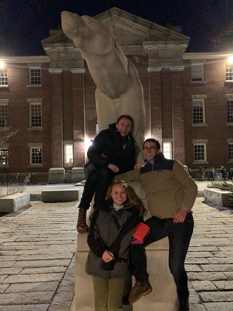 students in front of the Hyde Plaza Polar Bear statue