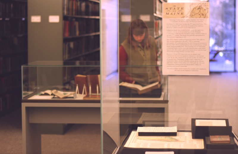 state of maine - marieke behind glass case