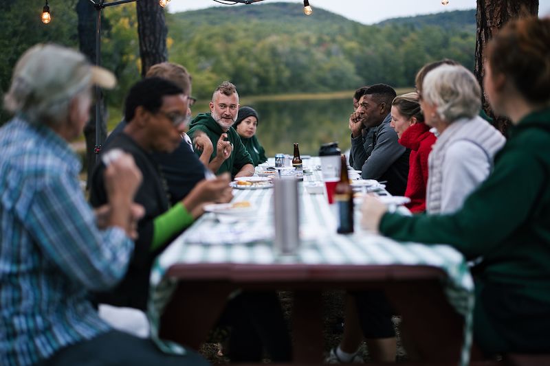 sitting around the picnic table