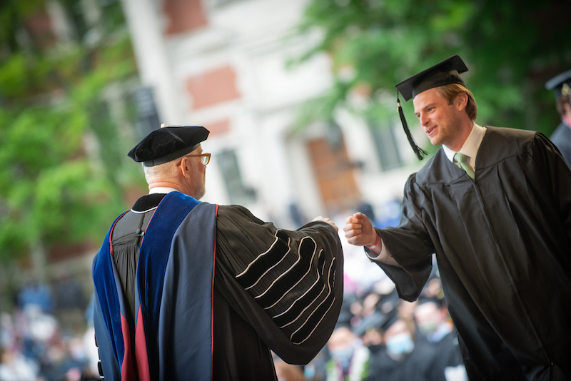 Fist bumping with President Rose