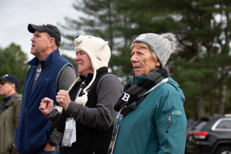 Parents cheer on sports teams