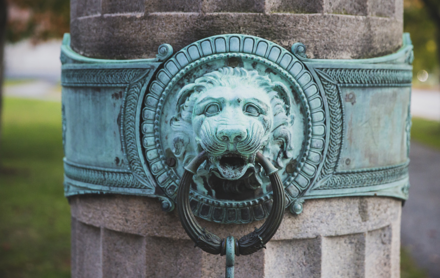 Lion detail from column on campus