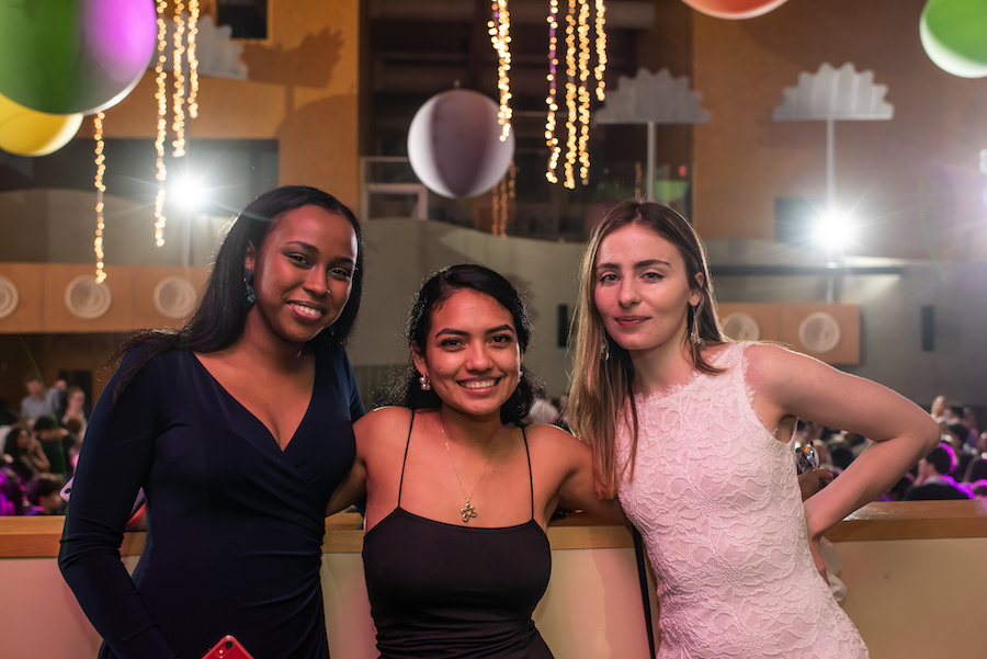 Posing under balloons and lights