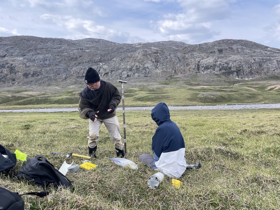 Phil Camill taking a soil core on Baffin Island