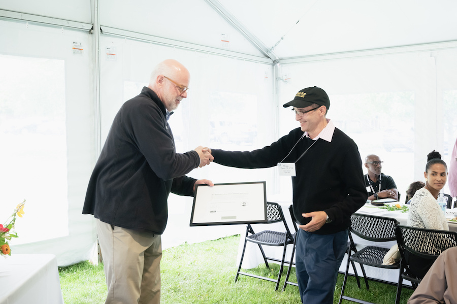 President Clayton Rose with  Dr. David Dickson II ’76, P’13