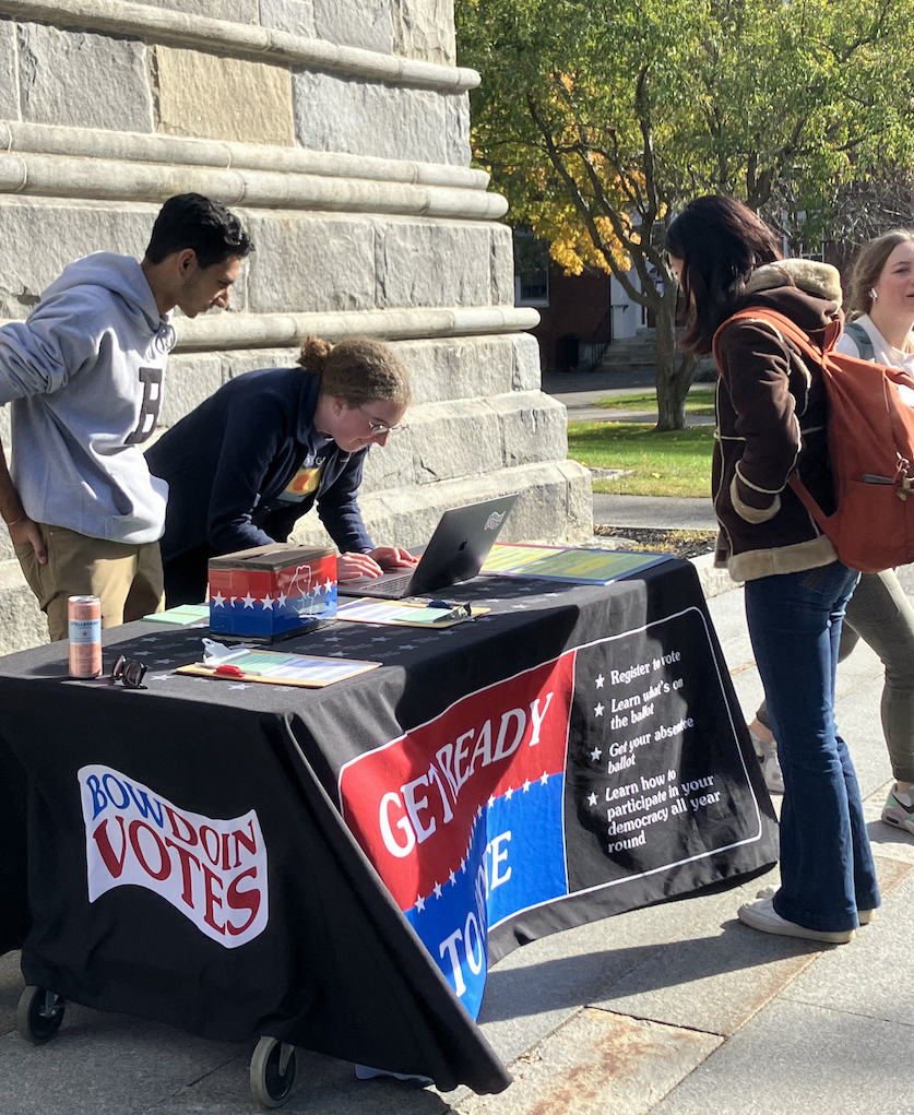 Bowdoin Votes registering students to vote on campus