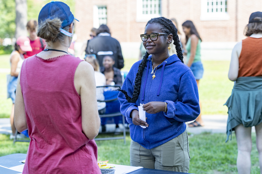 Students chat outside