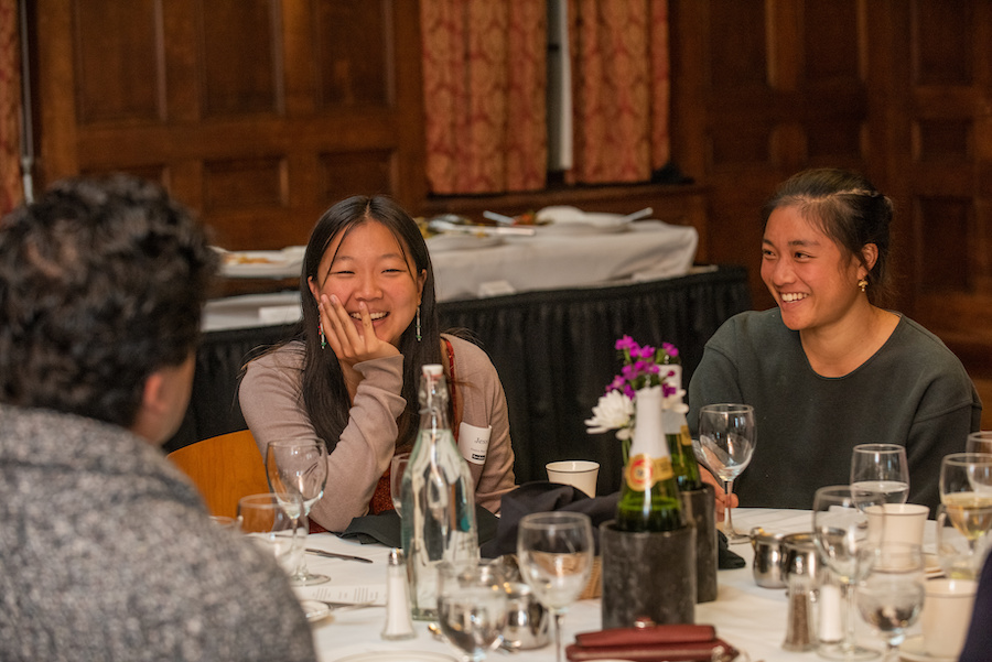 Jessica Bae smiling while seated at a table