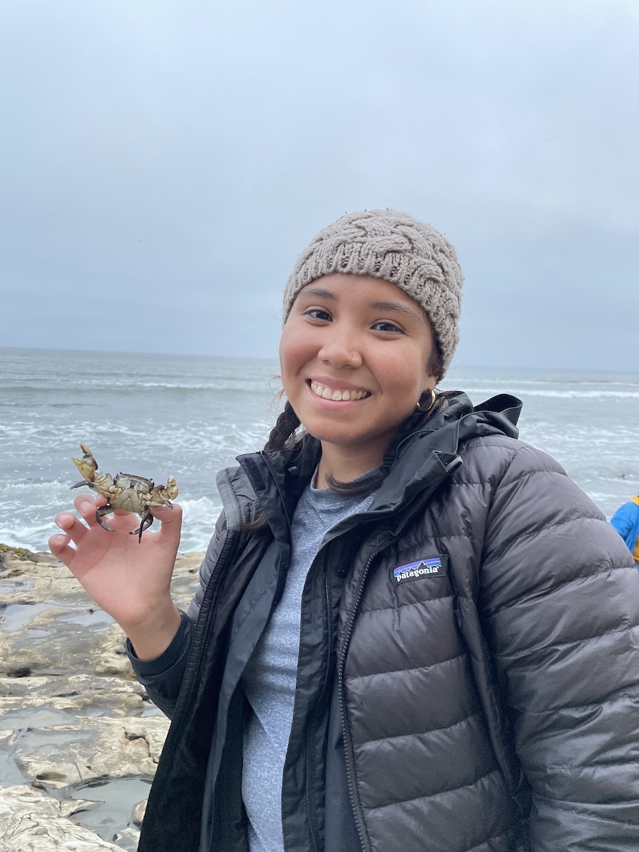 Kellie Navarro by the sea