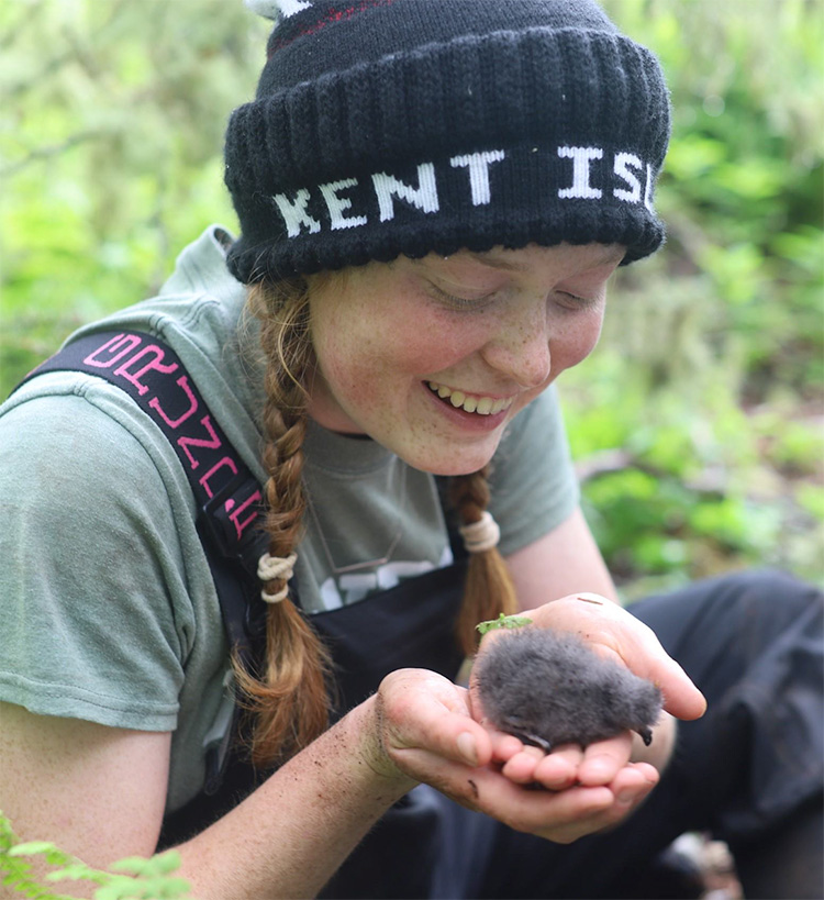 Megan Stretch ’24 working with petrels on Kent Island.