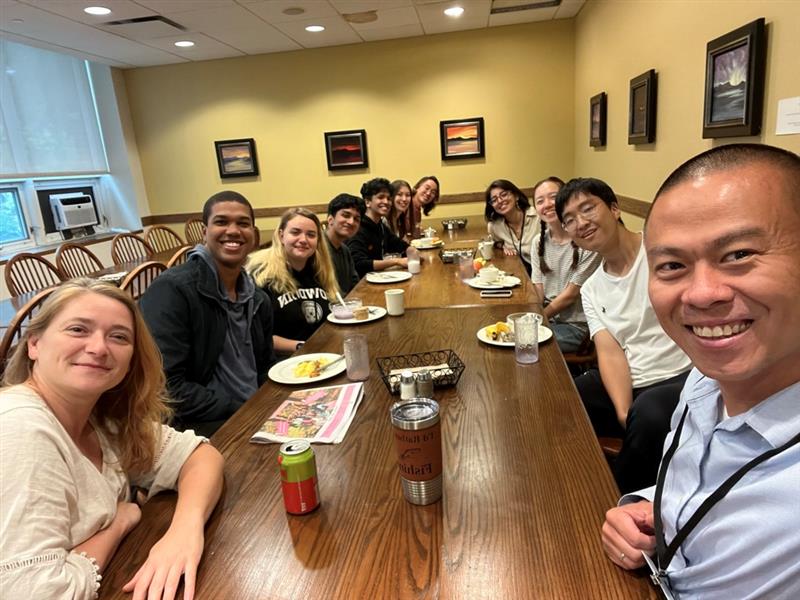 Dean Khoa Khuong and international students enjoy breakfast together