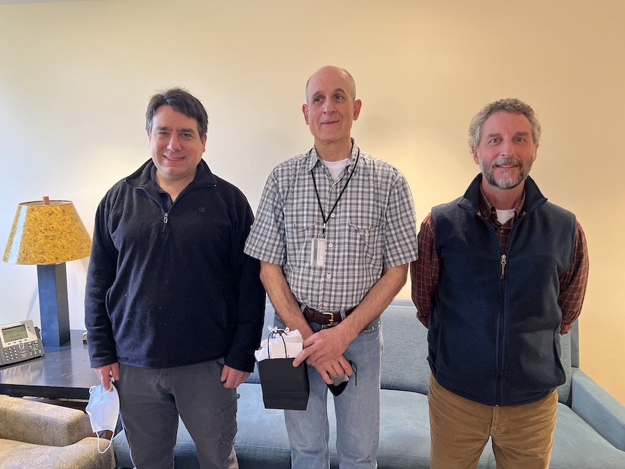 Library team: Bart D'Alauro, Guy Saldanha, and Carr Ross