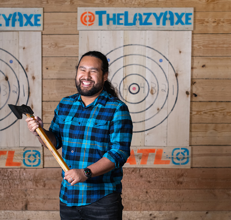 Mark Marisol holding an axe