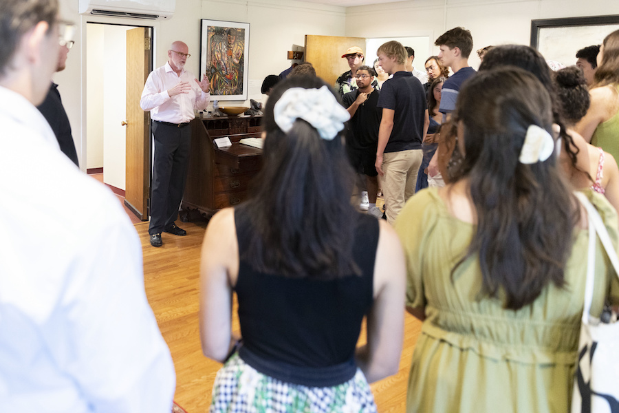 Clayton Rose welcomes a group of students during matriculation