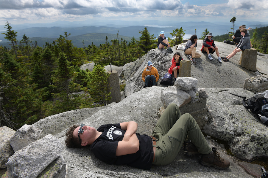 Resting atop a mountain during an orientation trip