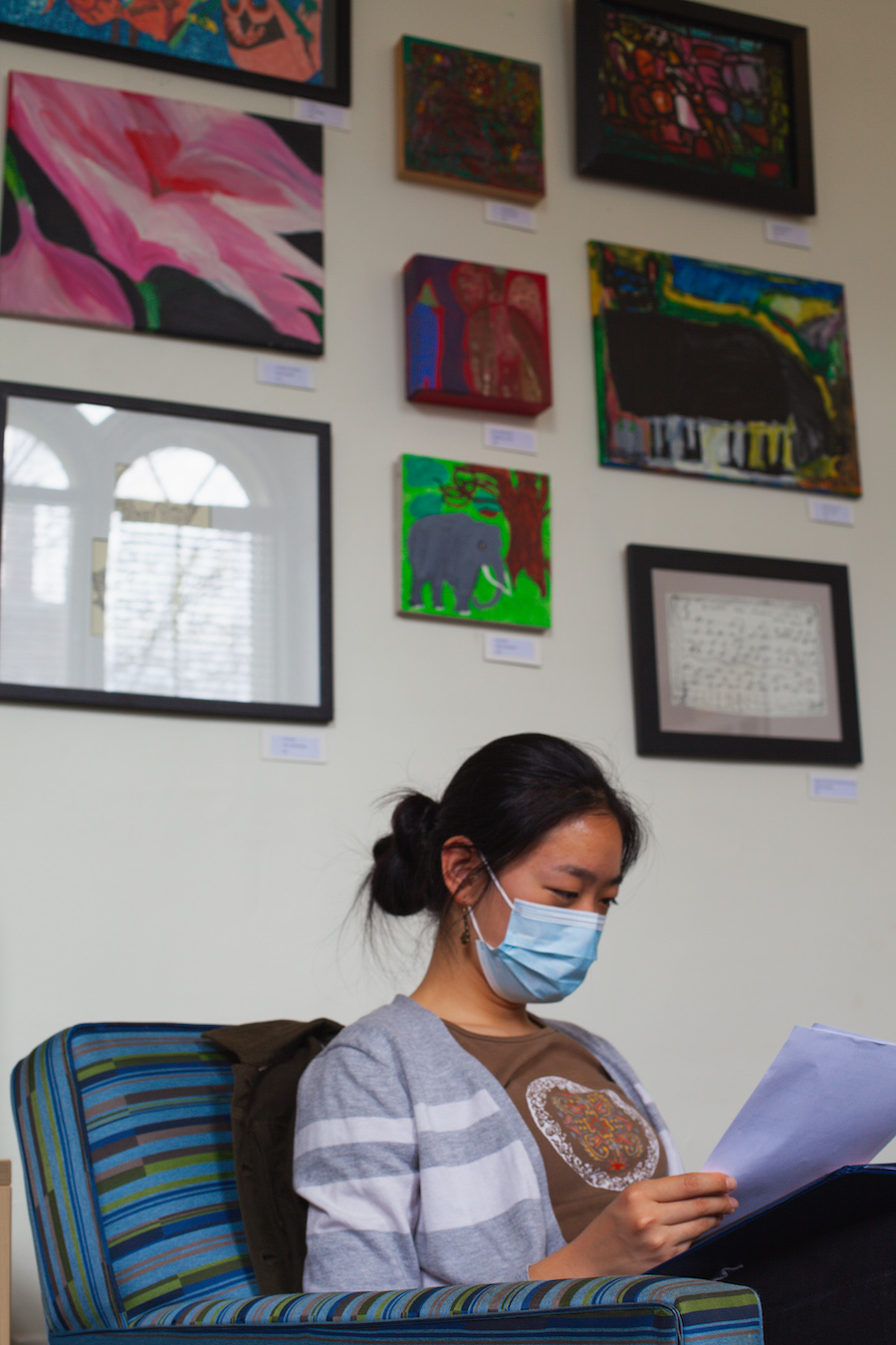 Spindleworks art above a student studying