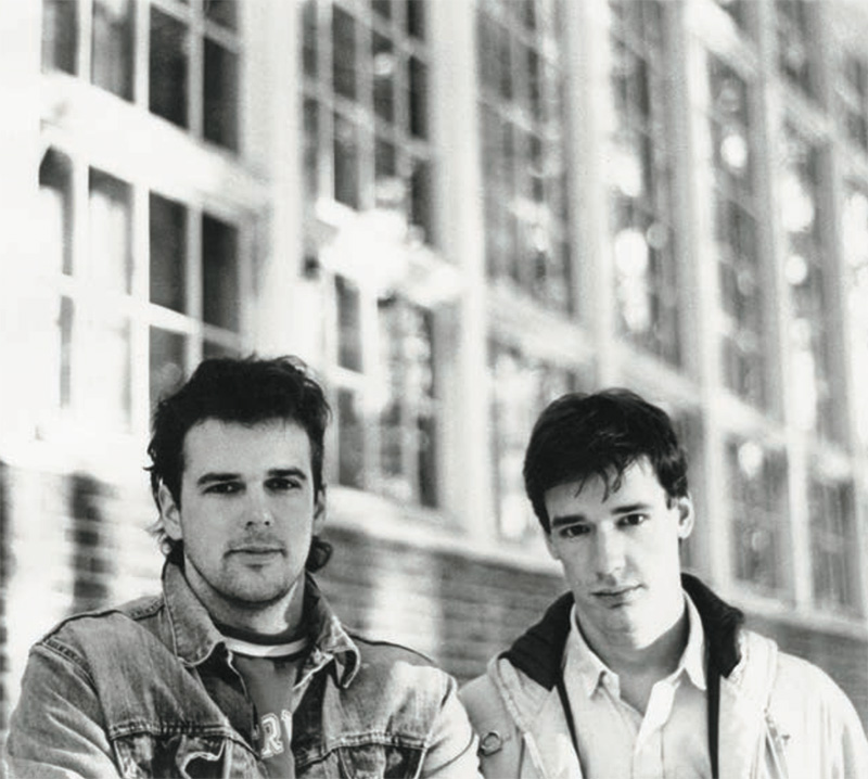 Covell (left) with friend Grant Booth ’86 in front of the old Longfellow School during their senior year at Bowdoin.