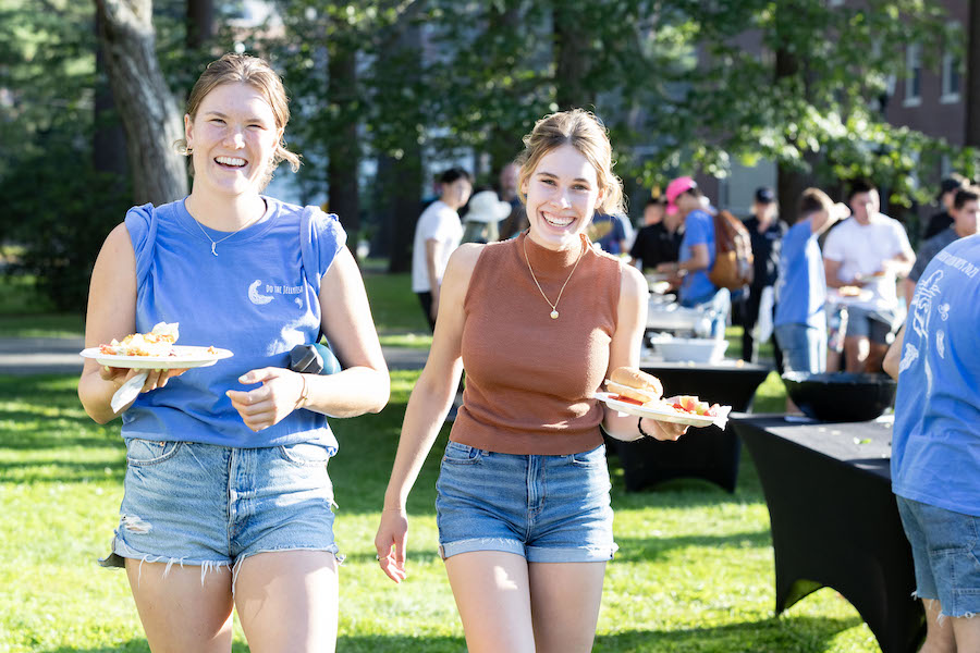 Students walking together in the sun