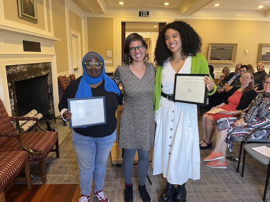 Monica Bouyea ’14, center, with Samaa Abdurraqib of the Maine Humanities Council and Veronica Pounds from Indigo Arts Alliance.