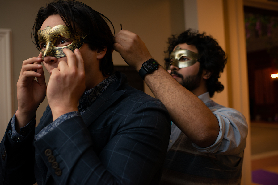 Ebony Ball putting on masks